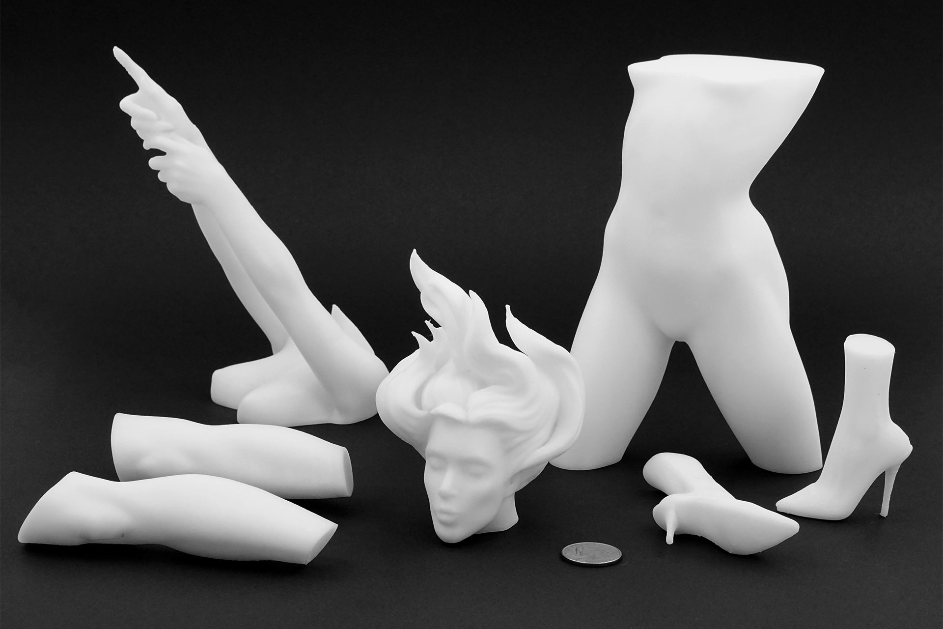 White ABS 3D printed parts of an artistic sculpture.