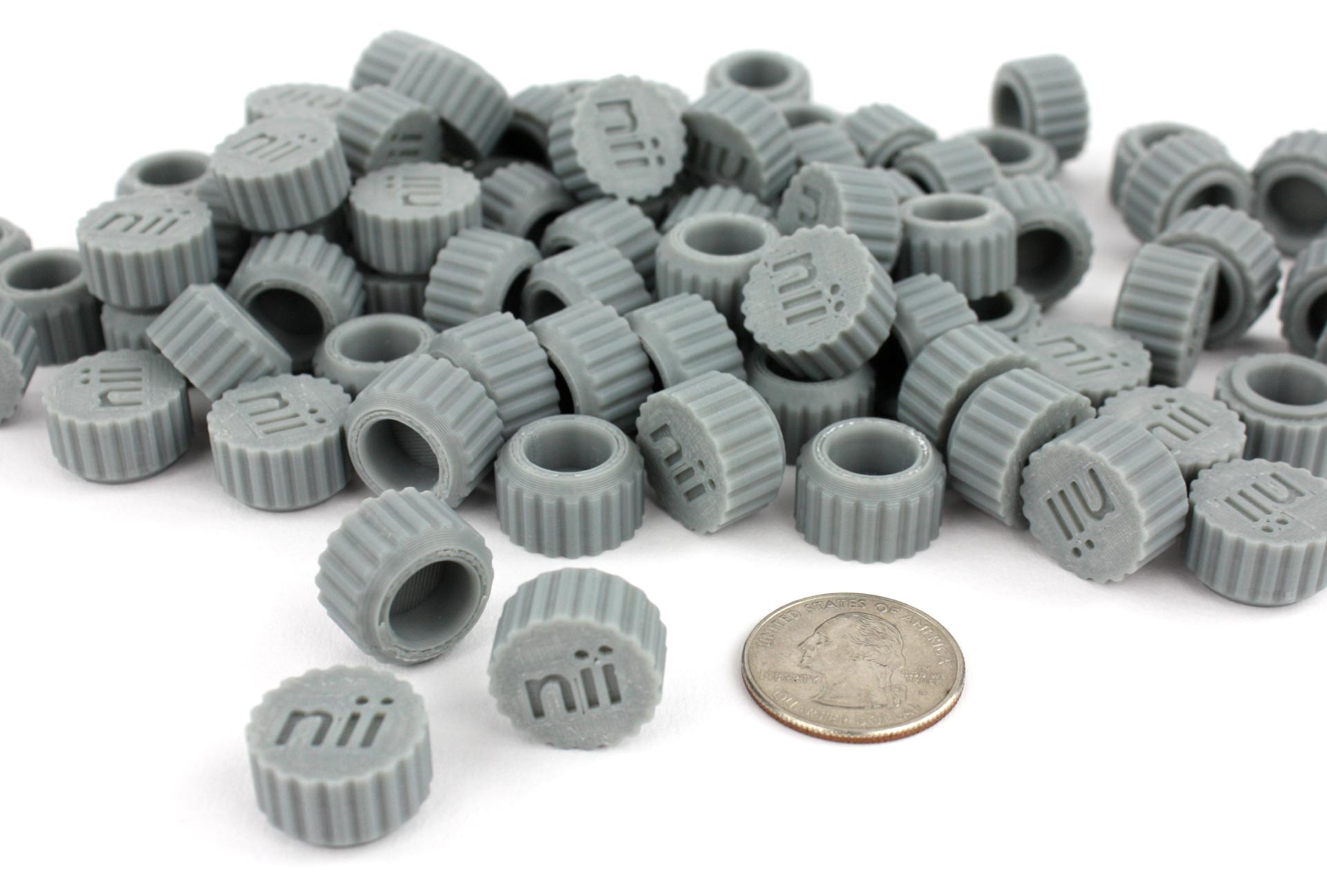 A stack of 3D printed knobs.