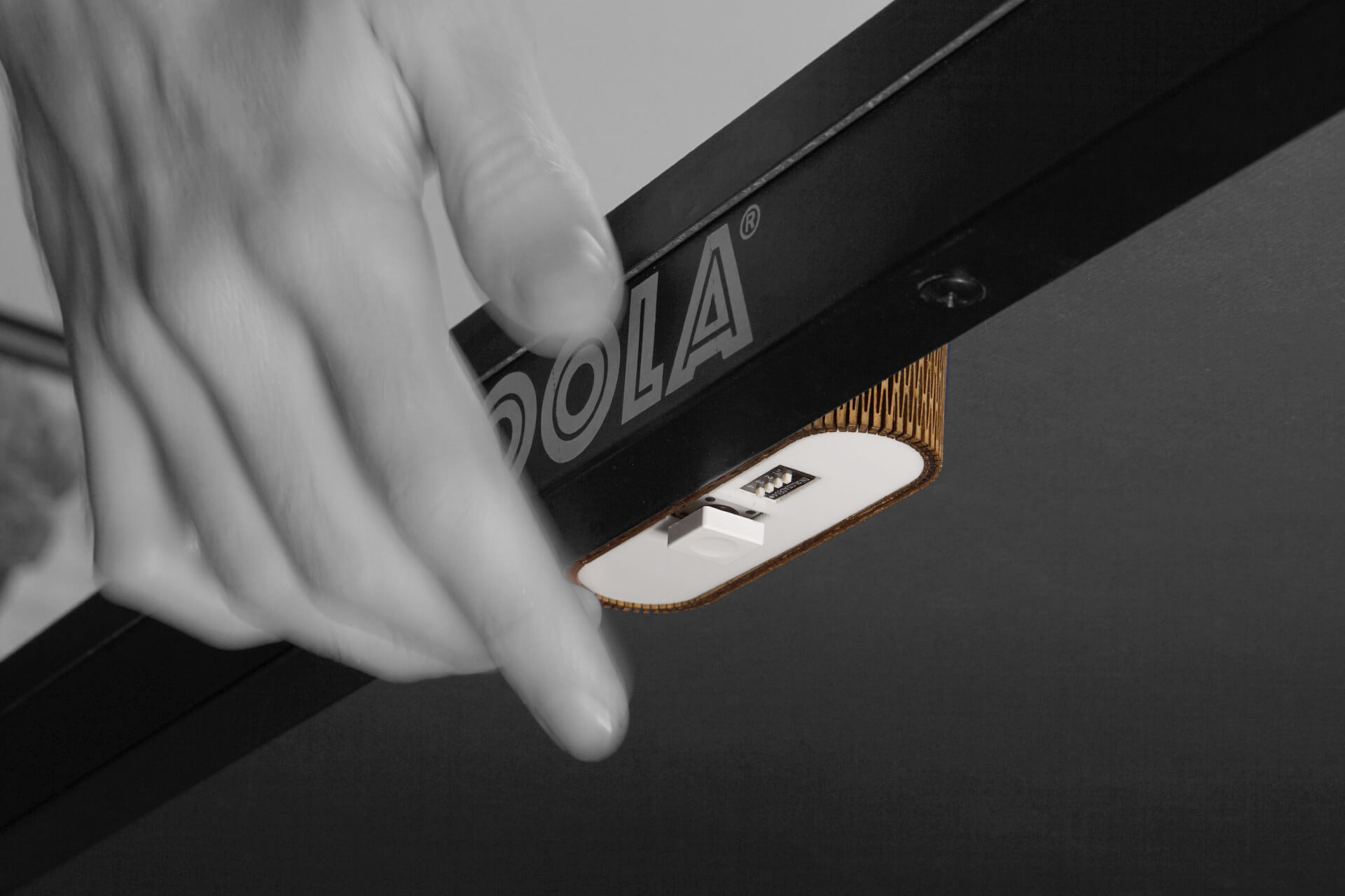 An in-use shot of the wireless button.