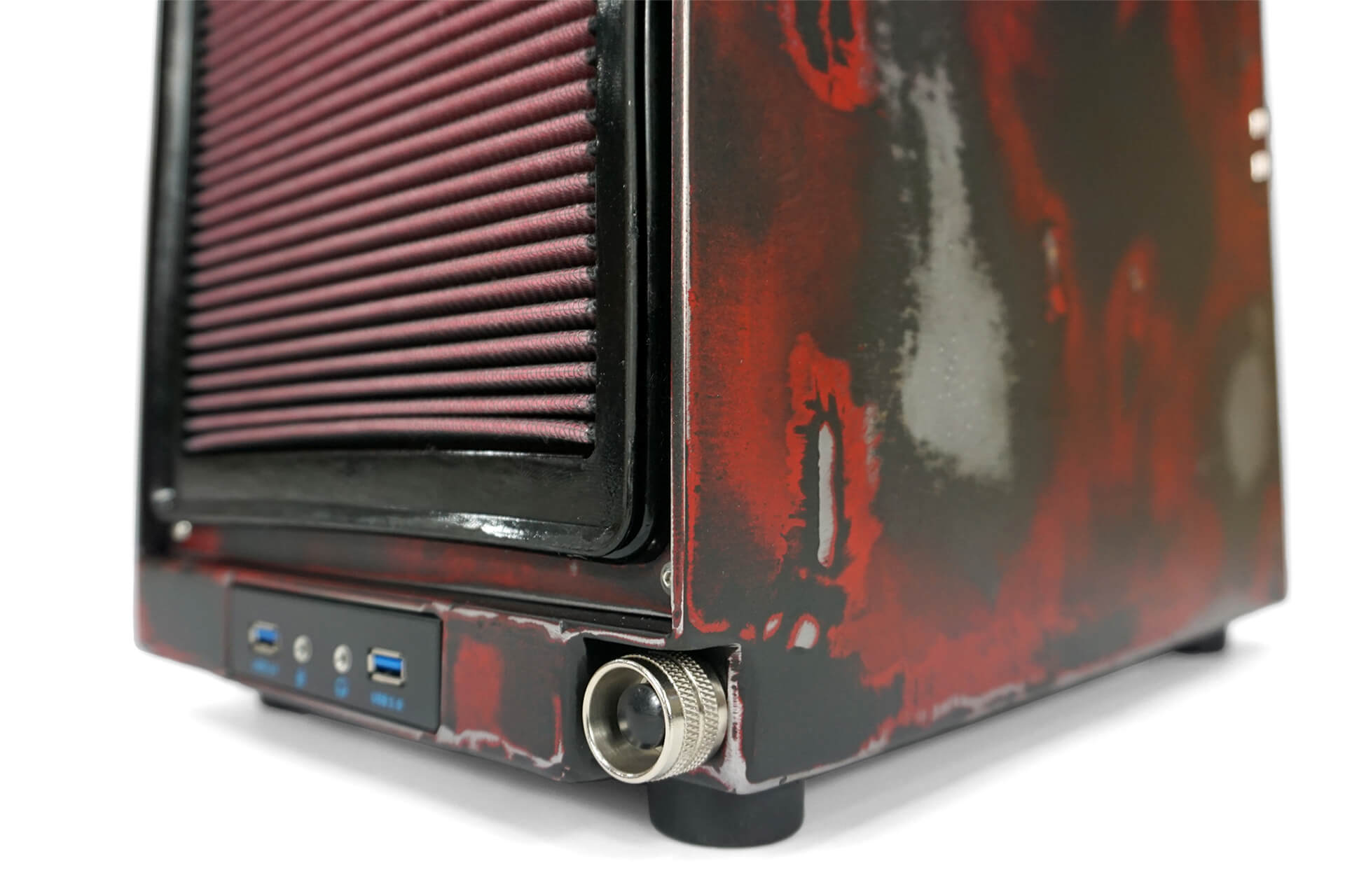 A detail showing the automotive starter switch power button.