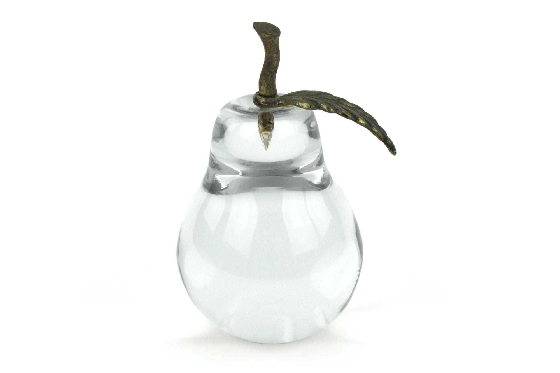 A glass pear with a bronze leaf and stem.